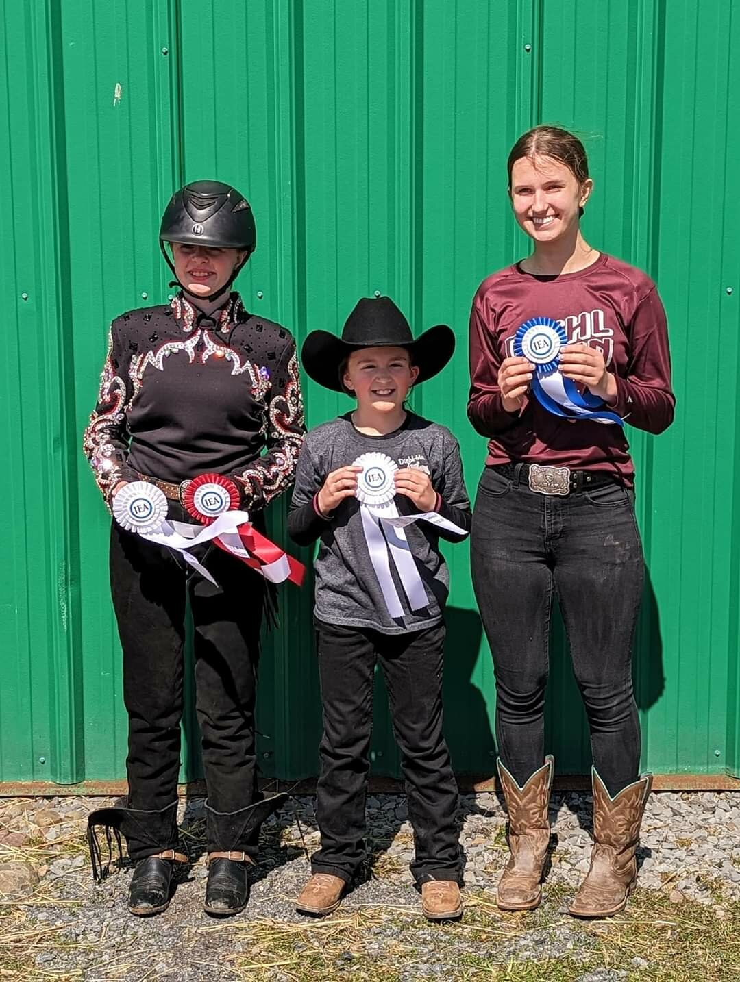 Diehl Me In's Western riders competed in the regional finals, and two qualified for the national show in Fort Worth, TX. Pictured are Haley Hahn, left; Gretchen Petry; and Sandra Hanofee.